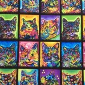 May include: A colourful fabric featuring a repeating pattern of cats. Each cat is depicted in a different colour scheme, with vibrant hues of pink, blue, green, yellow, and purple. The cats are all looking directly at the viewer.