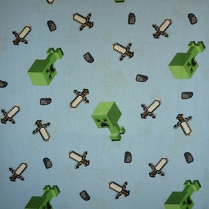 Minecraft MoJang Mini Mob Creeper Nintendo Blue Background Cotton Quilting Fabric 1/2 YARD