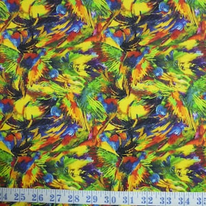 May include: A colorful fabric with a repeating pattern of parrots with bright blue, green, yellow, red, and orange feathers. The fabric is on a yellow background.