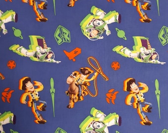Disney Toy Story 4 Buzz and Woody Blue Background Cotton Quilting Fabric 1/2 YARD