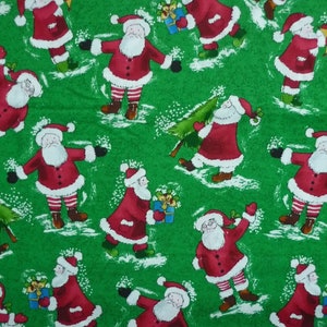 Holly Jolly Christmas Santa Green Background Cotton Quilting Fabric 1/2 YARD