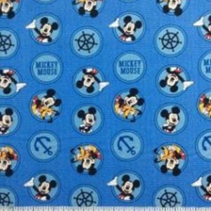 Disney Mickey Mouse i przyjaciele w kółkach niebieska bawełniana tkanina pikowana 1/2 YARD