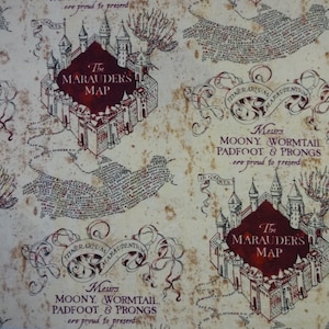 May include: A beige fabric with a repeating pattern of the Marauder's Map from the Harry Potter series. The map features a castle, text, and the words "Messrs Moony Wormtail Padfoot & Prongs are proud to present The Marauder's Map".