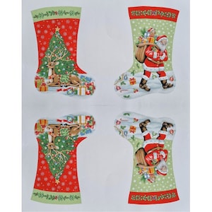 May include: Four Christmas stockings with different designs. Two stockings feature a red background with a green Christmas tree and a reindeer. The other two stockings feature a green background with a white star pattern and Santa Claus carrying a bag of gifts.
