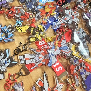 PREORDER TRANSFORMERS 2.5 inch Charms with Lanyards - Wristlet