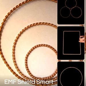 May include: Copper-colored EMF Shield Smart Meter Ring. The image shows a large, spiraling ring with a braided texture, along with three smaller rings, a square, and a circle. The text "EMF Shield Smart Meter Ring" is at the bottom.