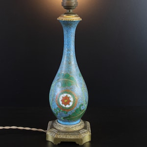 Antique bronze with porcelain lamp.