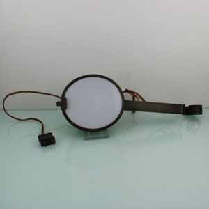 Antique banjo string instrument brass wall lamp.