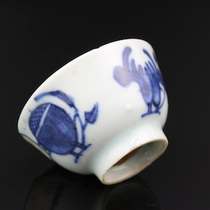 Antique Chinese blue & white small porcelain wine teacup with wax seal mark.