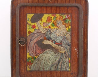 Art Nouveau kast als koekblik.