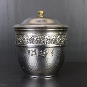 Art Nouveau silver plated floral tabaco pot.