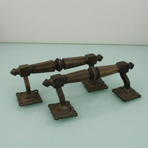 Antique pair of victorian brass wooden door or window handles.