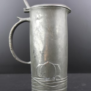 Art Nouveau pewter decanter jug by English Pewter ( In the manner of liberty & Co)