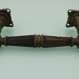 Antique victorian brass wooden door or window handle.