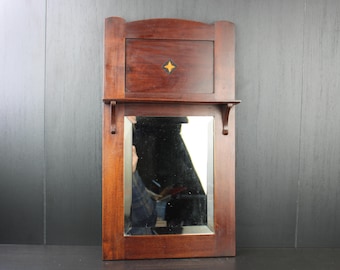 Antique Edwardian wall mirror with top shelf.