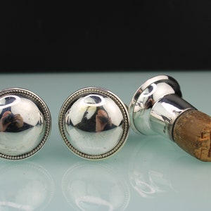 Art Deco set of three bottle corks by WMF