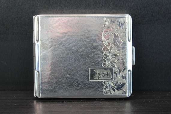 Antique silver plated engraved cigarette case by Robert Craft.