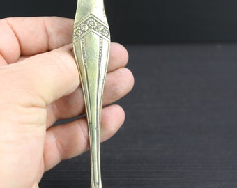 Pinza per zucchero in ottone Art Nouveau.