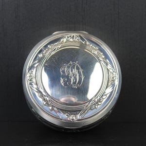 Art Nouveau silver plated floral trinket jewelry box.