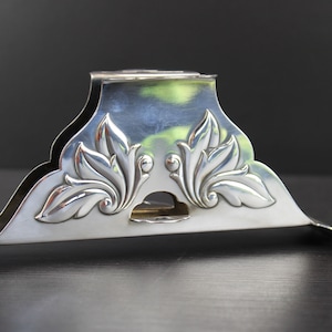 Art Deco silver plated floral napkin and butter knife holder by Georg Jensen