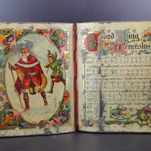 Antique book like Good King Wenceslas songbook biscuit tin by Huntley & Palmers