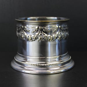 Art Nouveau silver plated floral bottle holder coaster.