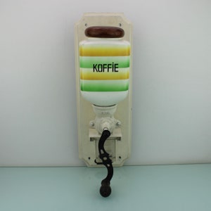 Art Deco earthenware bright striped coffee grinder.