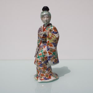 Antique porcelain Japanese lady figure with fan Imari of bijin. 19th C
