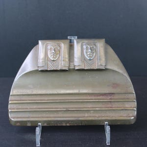 Art Nouveau two lady face inkwell.