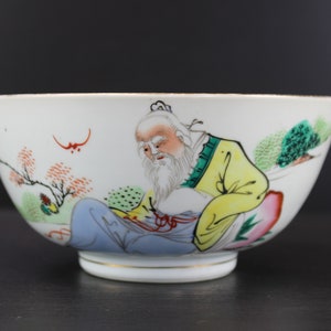 A vintage Chinese porcelain bowl with old man.