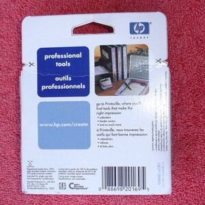 May include: A white cardboard package with a blue and white logo that says "hp invent". The package has a blue and white label that says "professional tools" and "outils professionnels". The package also has a barcode and the text "www.hp.com/create".