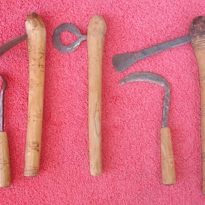 Miniature Weapons and Agriculture Tools Resembling Iron Age Items With That Ancient Archeological Find Rustic Look For Great Display