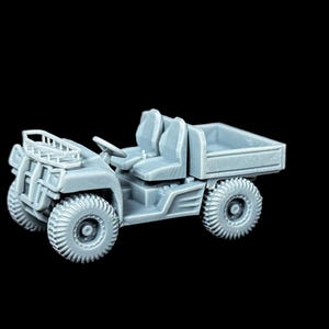 May include: A miniature grey utility vehicle model featuring a front cargo rack, a steering wheel, two moulded seats, and a rear cargo bed. The vehicle has four thick, treaded tyres and a detailed chassis, presented as a single unpainted plastic piece.