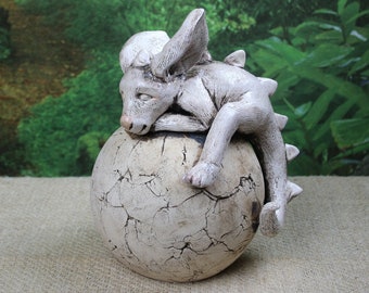 Sleeping gargoyle on a ball, unique ceramic