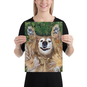 May include: A golden retriever dog lying on its back with its paws in the air. The dog is smiling and has its tongue sticking out. The dog is on a bed of green grass.