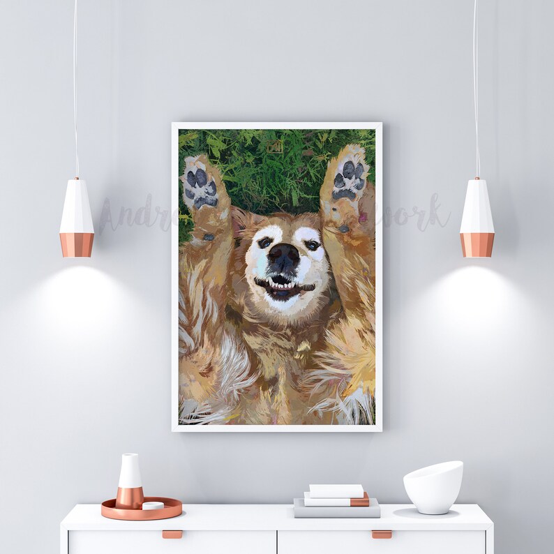 May include: A golden retriever dog lying on its back with its paws in the air, smiling with its tongue out. The dog is on a green grassy background.