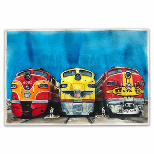 May include: A watercolor painting of three vintage diesel locomotives side by side. The left train is orange and red with the number 6002. The center train is yellow with a winged emblem. The right train is red and yellow with Santa Fe text.
