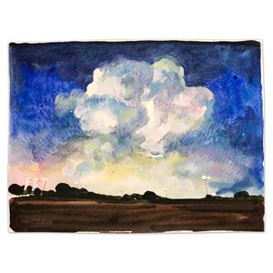 May include: Watercolor painting of a dramatic sky with a large, fluffy cloud formation. The sky transitions from deep blue to lighter hues, with a brown foreground and a few silhouetted trees and streetlights. The painting is signed and dated.