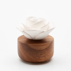 Perfume diffuser, porcelain flower, gardenia, wooden base in acacia, put essential oil on the porcelain flower, organic recycable. BY ANOQ image 1