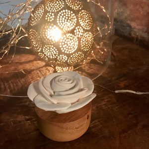 Perfume diffuser, porcelain flower, gardenia, wooden base in acacia, put essential oil on the porcelain flower, organic recycable. BY ANOQ image 10