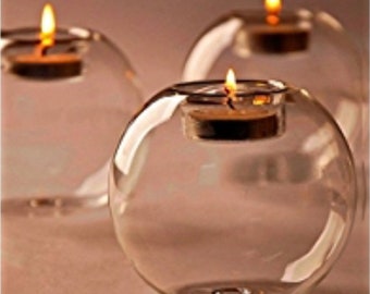 bougeoirs en verre, vendu par 3, photophores en verre transparent, reversibles ils deviennent des soliflores, forme ronde, diam 8. H 6,5 cm