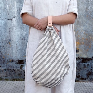 Furoshiki. Furoshiki bag. Leather strap or wooden handle