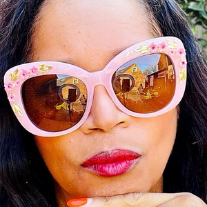 Big pink sunglasses store