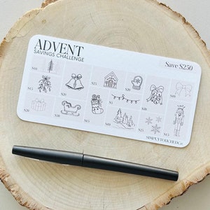 May include: A white card with black illustrations of Christmas icons, such as a Christmas tree, bells, a stocking, and a snowman. The card is titled "Advent Savings Challenge" and says "Save $250".
