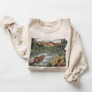 Felpa retrò con animali e fiori dello stato dell'Oregon - Felpa vintage anni '90 con castoro giallo e uva dell'Oregon - Felpa girocollo unisex boho