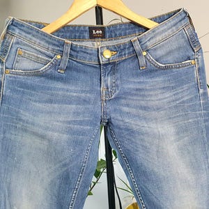 Vintage Lee Skinny Jeans: middelblauwe denim met lage taille (S/M)