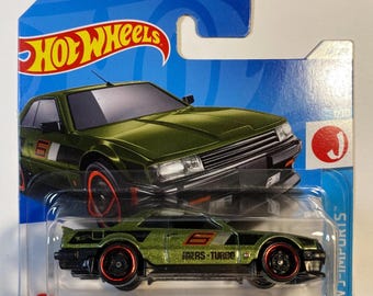 Hot Wheels Nissan Skyline RS (KDR30) | 1:64 JDM Diecast Samlarobjekt | Sällsynt Klassiker för Entusiaster och Samlare