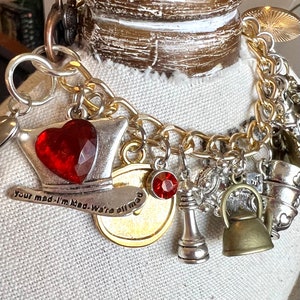 Alice in Wonderland bracelet. Alice in Wonderland mad hatter Wonderland and Eat me Charm bracelet. Through the looking glass bracelet. ALICE