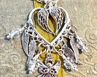 Angel wings necklace. Angel necklace. Angel wing necklace. Angel wing jewelry.