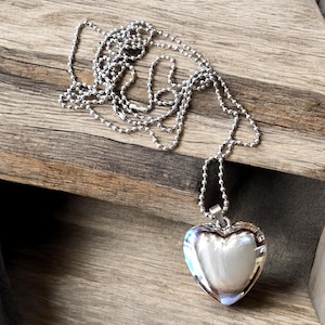 Minimalist Silver toned Puffed Heart Necklace Can be worn many ways Even as a belt. This fun necklace features a puffed heart shaped pendant
